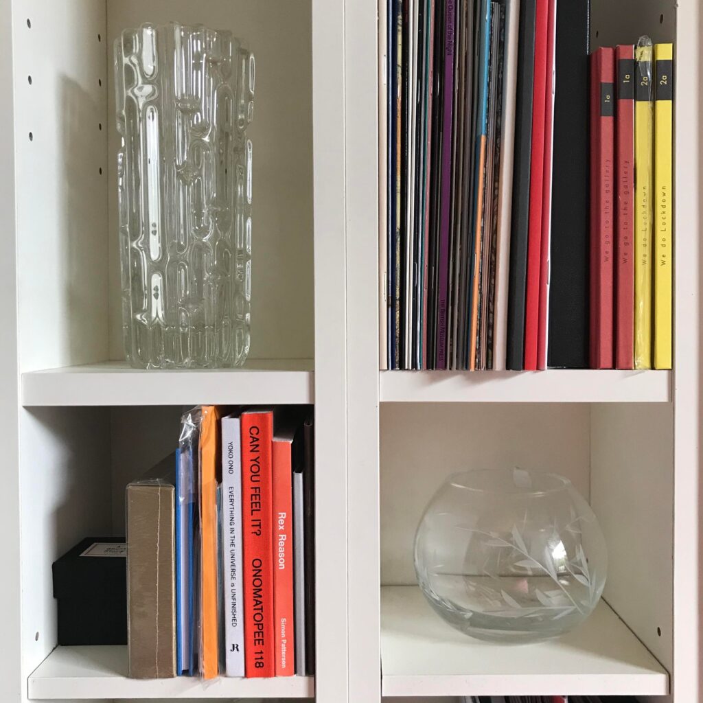 Small books and glass vases